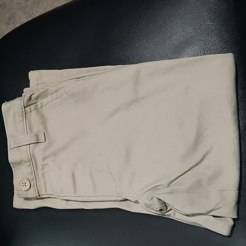 Khaki long pants with front pockets and one back right pocket by French Toast